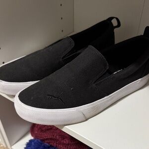 Puma Women’s Black and White Slip-On Sneakers